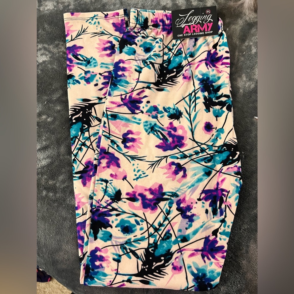 Brand new with tags, never worn. LeggingArmy, plus size leggings.